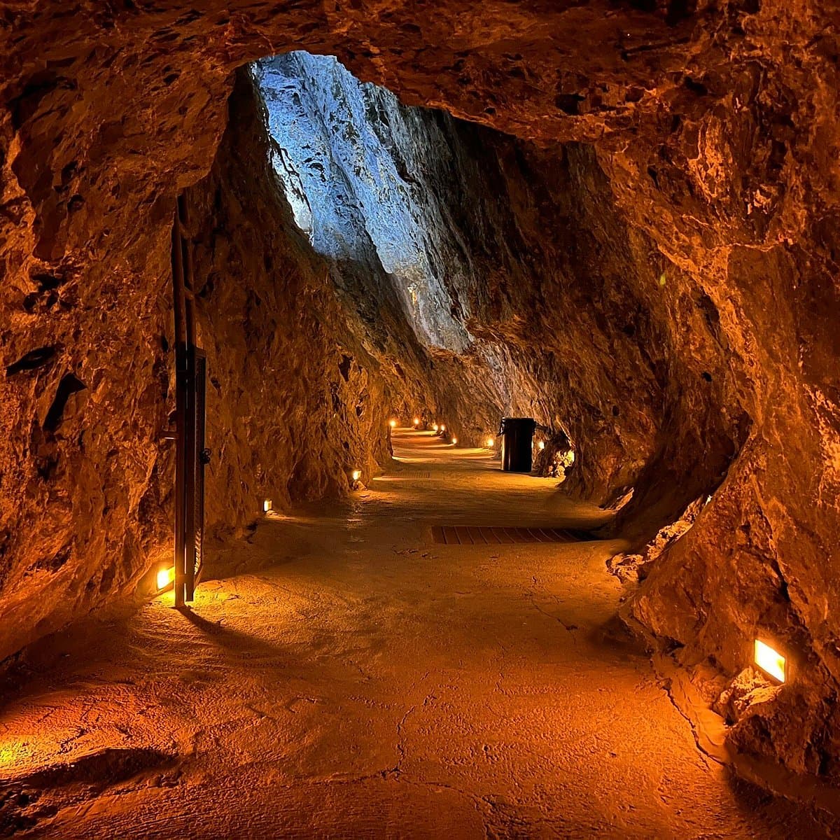 Lit tunnel inside a historic mine